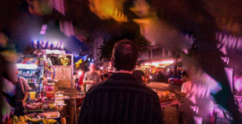 Rob Morris walking in the Philippines with undercover trafficking investigators