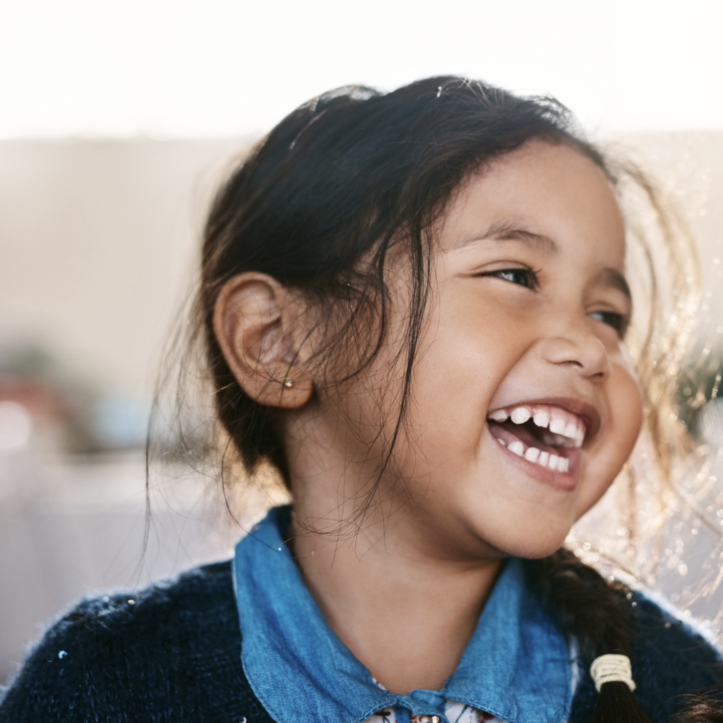 child smiling laughing