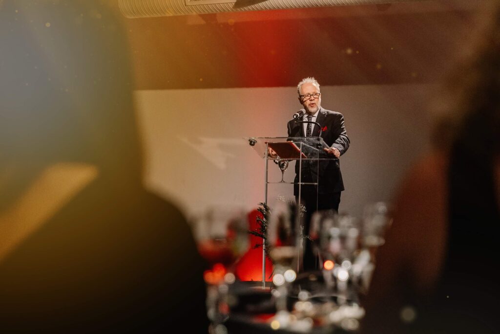 Rob Morris speaking at the Love146 Red Gala